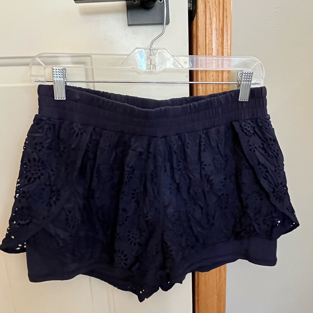 Aerie blue flower eyelet textured feminine nylon running active shorts. Large